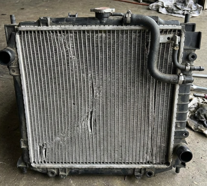 radiator mobil rusak